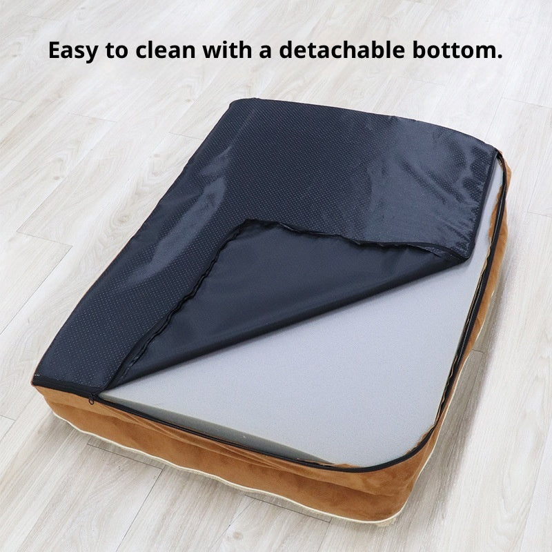 Joint Support Orthopedic Dog Bed with detachable bottom on a wooden floor, text 'Easy to clean with a detachable bottom.'